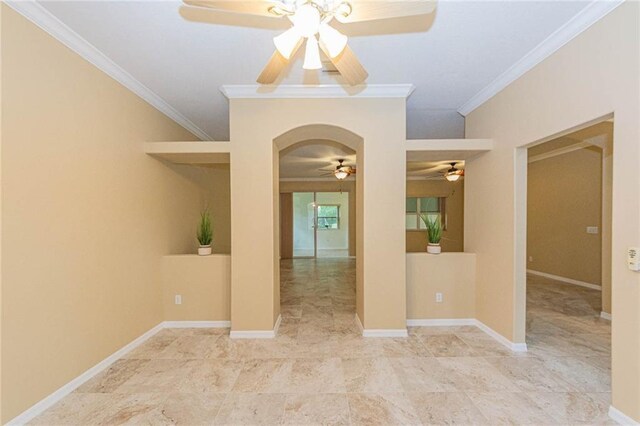 7941 Cabot Tower Pl, Vero Beach, FL 32966 - empty room with ceiling fan, ornamental molding, arched walkways, and baseboards
