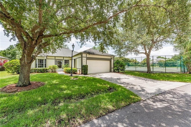 7941 Cabot Tower Pl, Vero Beach, FL 32966 - ranch-style home featuring a garage, concrete driveway, and stucco siding