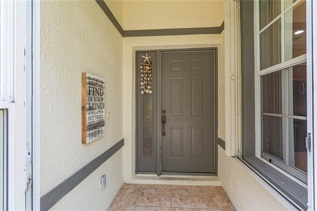 7941 Cabot Tower Pl, Vero Beach, FL 32966 - doorway to property featuring crawl space