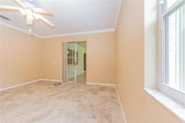 7941 Cabot Tower Pl, Vero Beach, FL 32966 - spare room featuring ornamental molding, ceiling fan, and baseboards