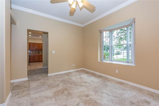 7941 Cabot Tower Pl, Vero Beach, FL 32966 - spare room featuring crown molding, a ceiling fan, baseboards, and a sink