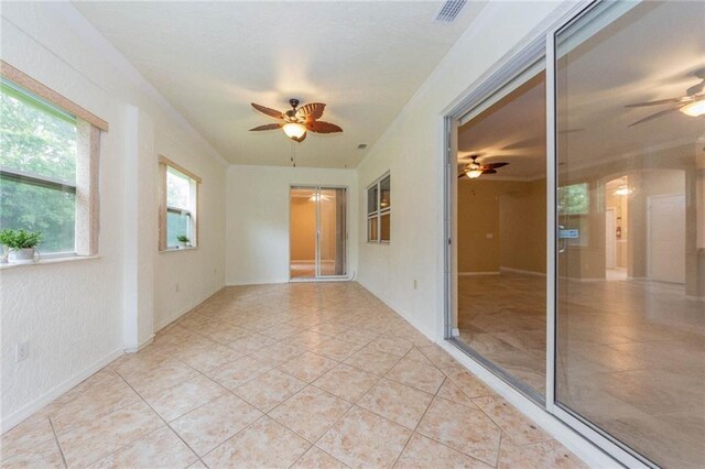 7941 Cabot Tower Pl, Vero Beach, FL 32966 - unfurnished room featuring a ceiling fan and light tile patterned flooring