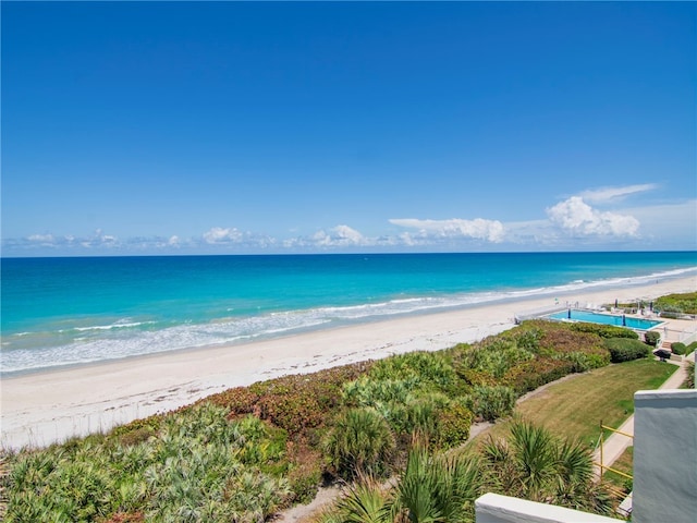 view of water feature with a beach view