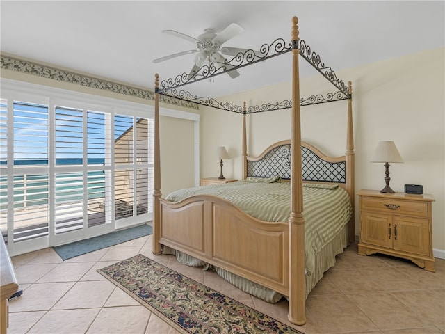 bedroom featuring access to outside, ceiling fan, and light tile patterned floors