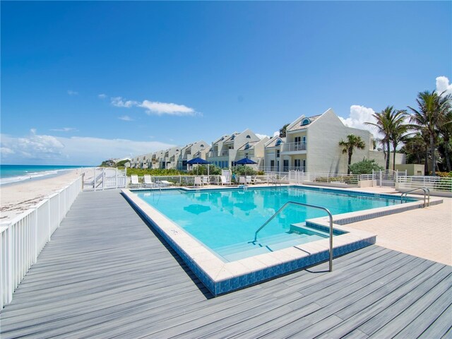 8444 Oceanside Dr Unit D31, Indian River Shores, FL 32963 - community pool featuring fence, view of local beach, and a deck with water view