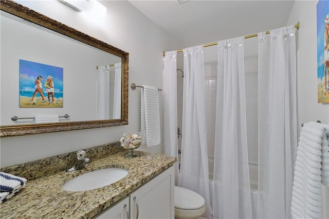 full bathroom with vanity, toilet, and shower / bathtub combination with curtain