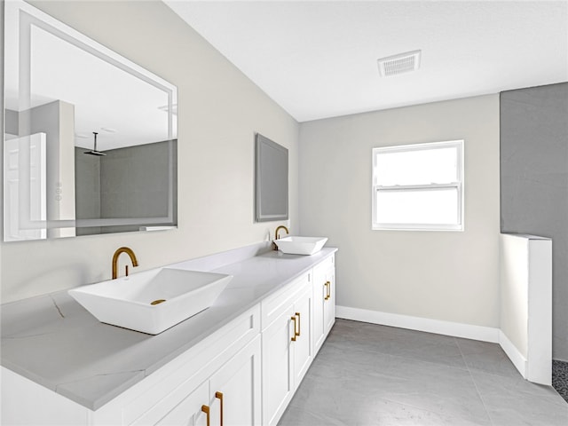 bathroom featuring vanity and walk in shower