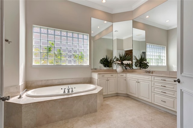 bathroom with ornamental molding, vanity, tile patterned floors, and a relaxing tiled tub