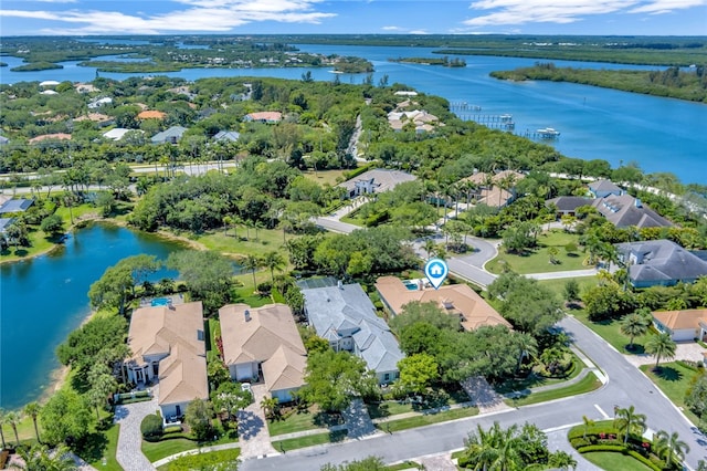 bird's eye view with a water view