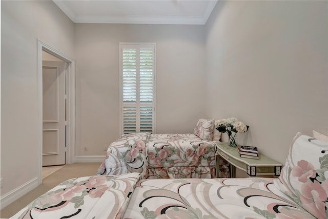 carpeted bedroom with crown molding