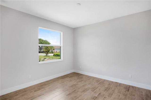 empty room featuring light hardwood / wood-style floors