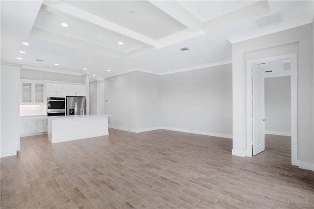 unfurnished living room featuring light hardwood / wood-style floors and crown molding