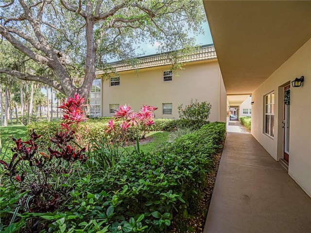 14 Vista Gardens Trl Unit 102, Vero Beach, FL 32962 - view of side of home with stucco siding
