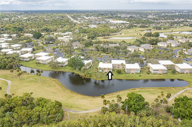 14 Vista Gardens Trl Unit 102, Vero Beach, FL 32962 - aerial overview of property's location featuring a large body of water, nearby suburban area, and a golf club