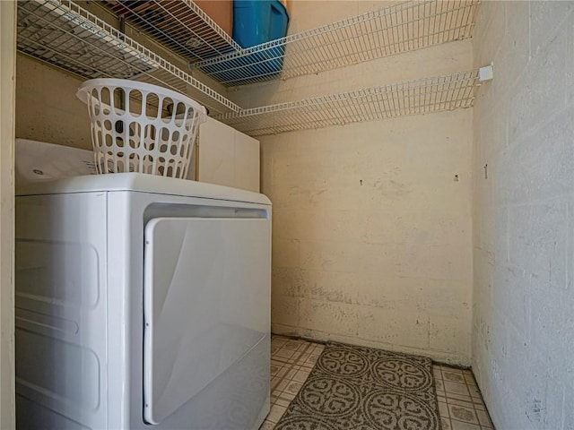 14 Vista Gardens Trl Unit 102, Vero Beach, FL 32962 - washroom featuring washing machine and dryer