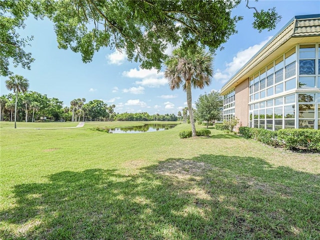 14 Vista Gardens Trl Unit 102, Vero Beach, FL 32962 - view of green lawn featuring a water view