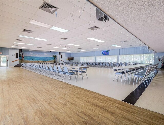 14 Vista Gardens Trl Unit 102, Vero Beach, FL 32962 - misc room featuring wood finished floors and a paneled ceiling