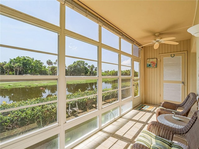 14 Vista Gardens Trl Unit 102, Vero Beach, FL 32962 - sunroom featuring a water view and a ceiling fan