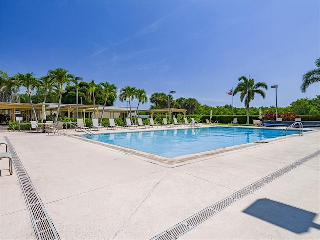 14 Vista Gardens Trl Unit 102, Vero Beach, FL 32962 - community pool featuring a patio area