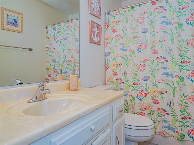 14 Vista Gardens Trl Unit 102, Vero Beach, FL 32962 - bathroom featuring vanity and toilet