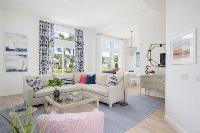 living room with light hardwood / wood-style flooring