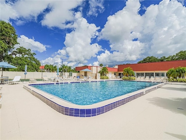 view of pool featuring a patio