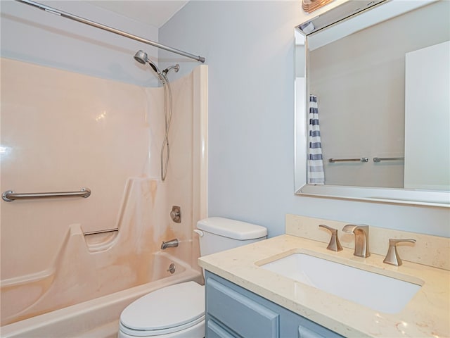 full bathroom featuring shower / bath combo with shower curtain, vanity, and toilet