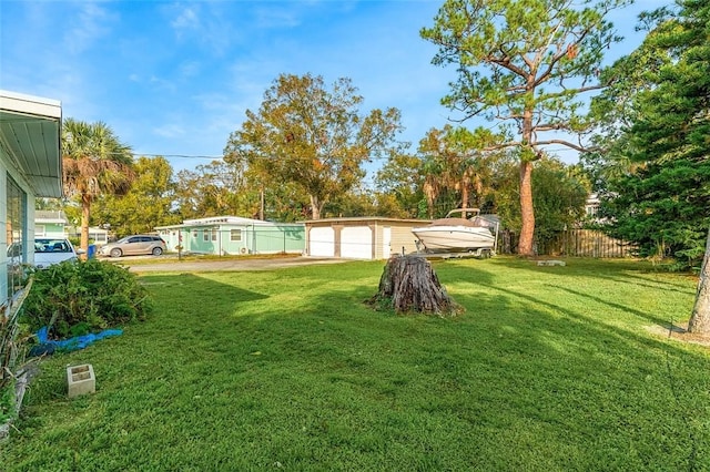 view of yard with a garage