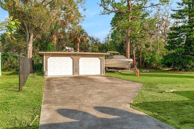 garage featuring a yard