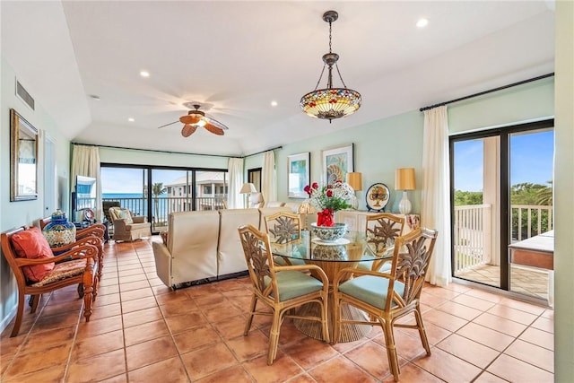 dining room featuring visible vents, plenty of natural light, and light tile patterned floors