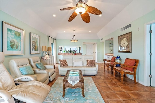 tiled living area with lofted ceiling, ceiling fan, recessed lighting, visible vents, and baseboards