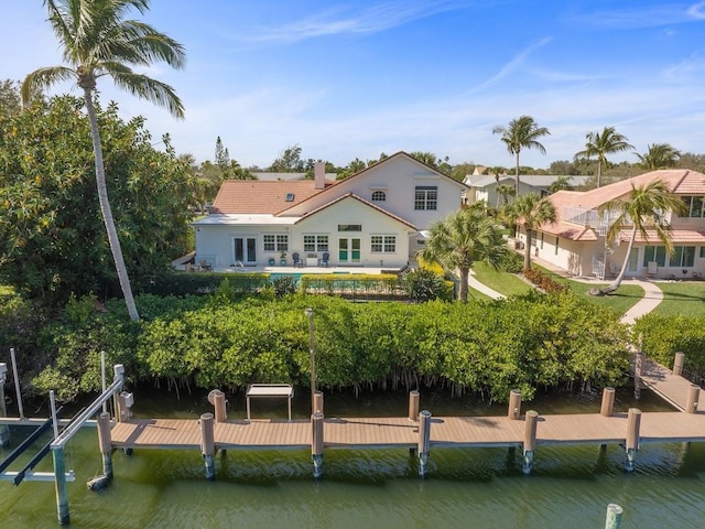 1880 Cobia Dr, Vero Beach, FL 32960 - rear view of property with a water view and stucco siding