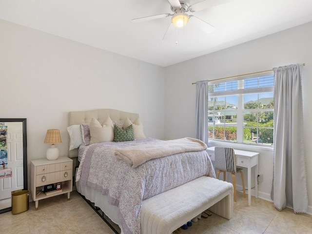 1880 Cobia Dr, Vero Beach, FL 32960 - bedroom featuring light tile patterned floors and ceiling fan
