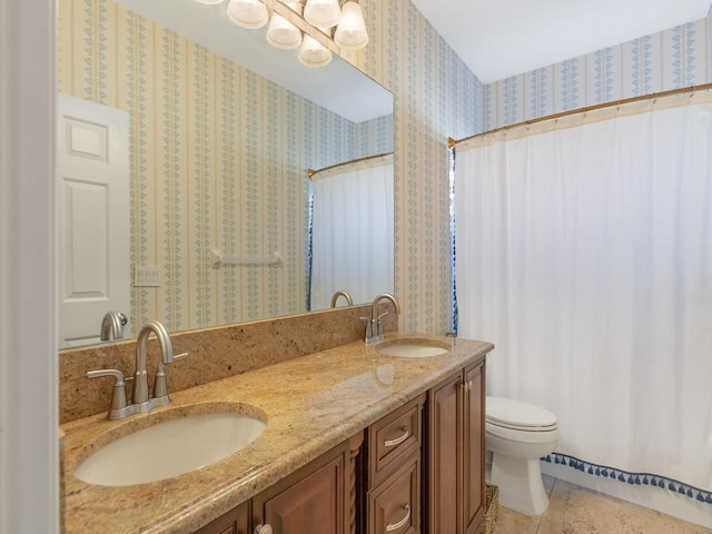1880 Cobia Dr, Vero Beach, FL 32960 - full bathroom with toilet, double vanity, tile patterned flooring, and a shower with shower curtain