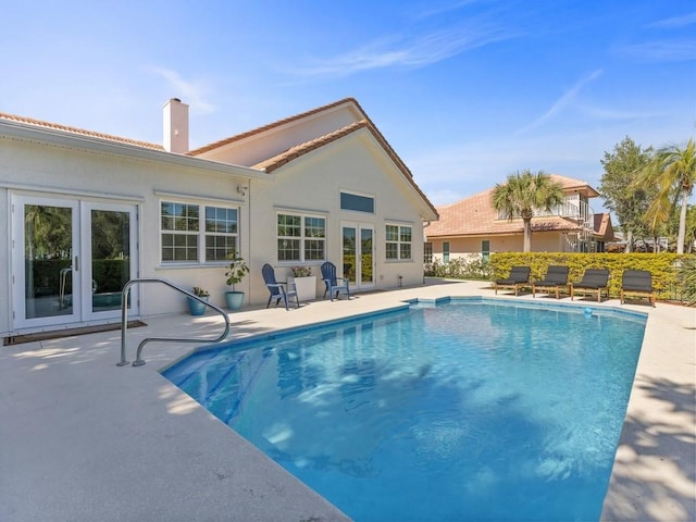 1880 Cobia Dr, Vero Beach, FL 32960 - view of swimming pool featuring a patio area and french doors