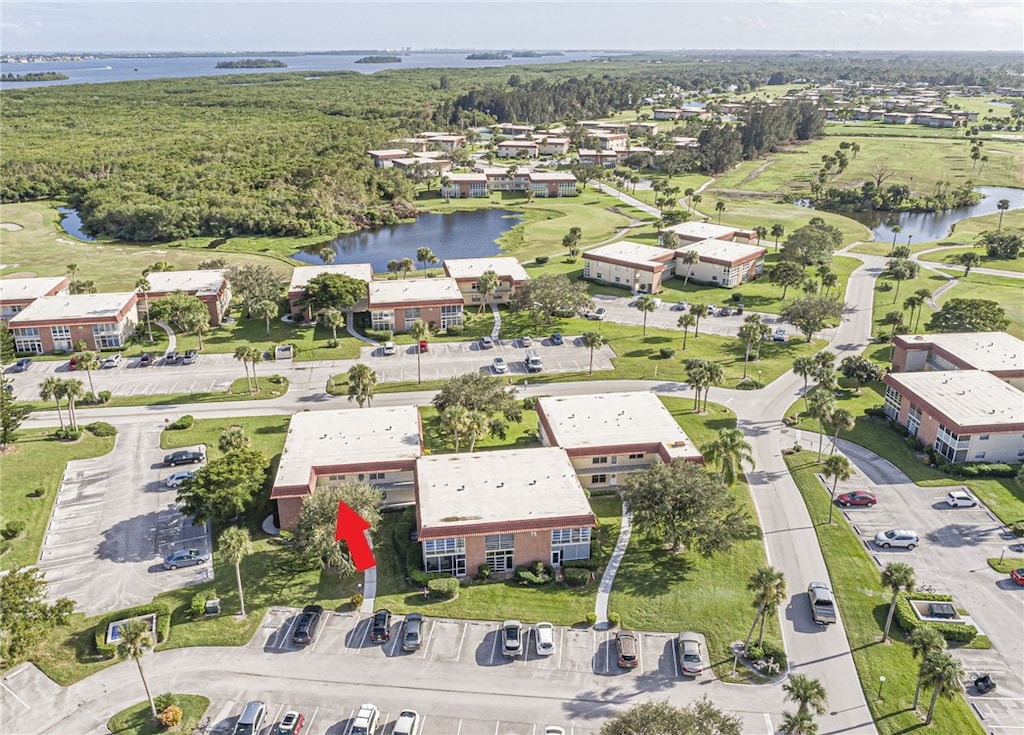 birds eye view of property featuring a water view