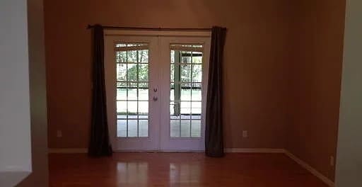 entryway featuring french doors