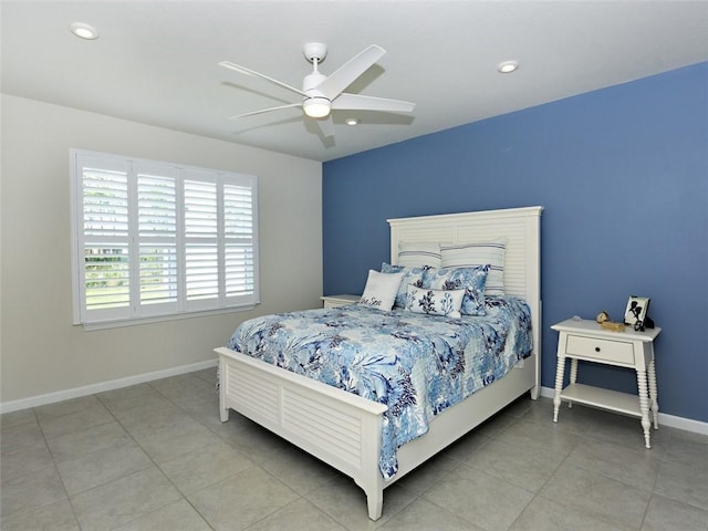 tiled bedroom with ceiling fan