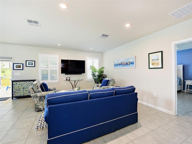 living room with light tile patterned flooring