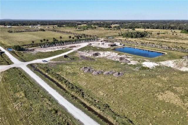 bird's eye view featuring a rural view and a water view