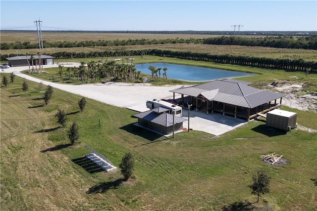 bird's eye view featuring a water view and a rural view