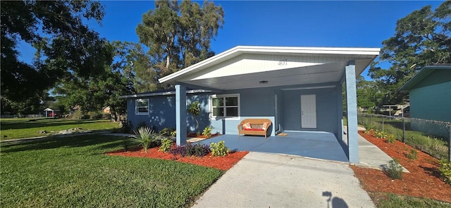 401 N 29th St, Fort Pierce, FL 34947 - view of front of home with a carport and stucco siding