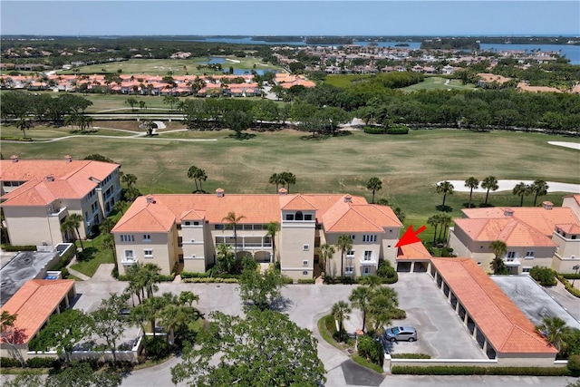 5030 Harmony Cir Unit 204, Vero Beach, FL 32967 - aerial perspective of suburban area with a nearby body of water and a local golf course
