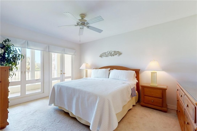 5030 Harmony Cir Unit 204, Vero Beach, FL 32967 - bedroom with light carpet and a ceiling fan