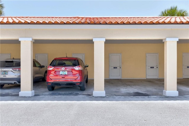 5030 Harmony Cir Unit 204, Vero Beach, FL 32967 - view of covered parking lot