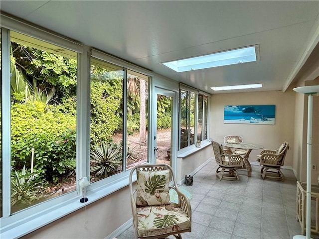 sunroom featuring a skylight