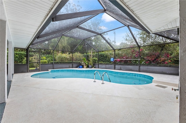 view of pool featuring a lanai and a patio area