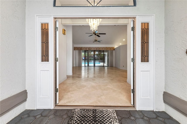 property entrance featuring ceiling fan