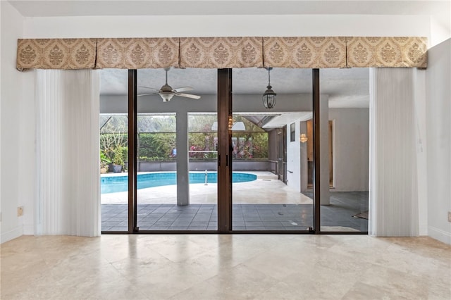 entryway with ceiling fan