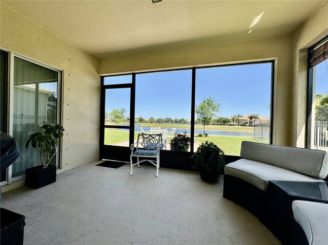 sunroom with a water view